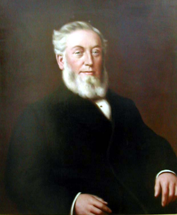 Oil portrait of an elderly man with white hair and a full white beard, in a dark frock coat and white shirt